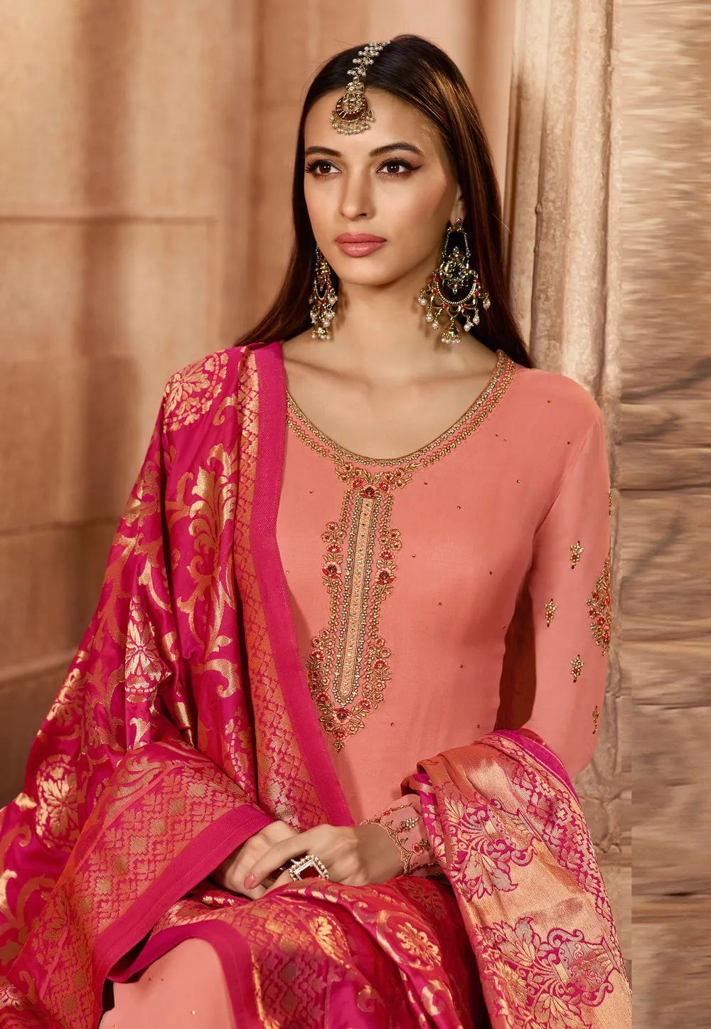 Peach And Pink Embroidered Satin Churidar Suit