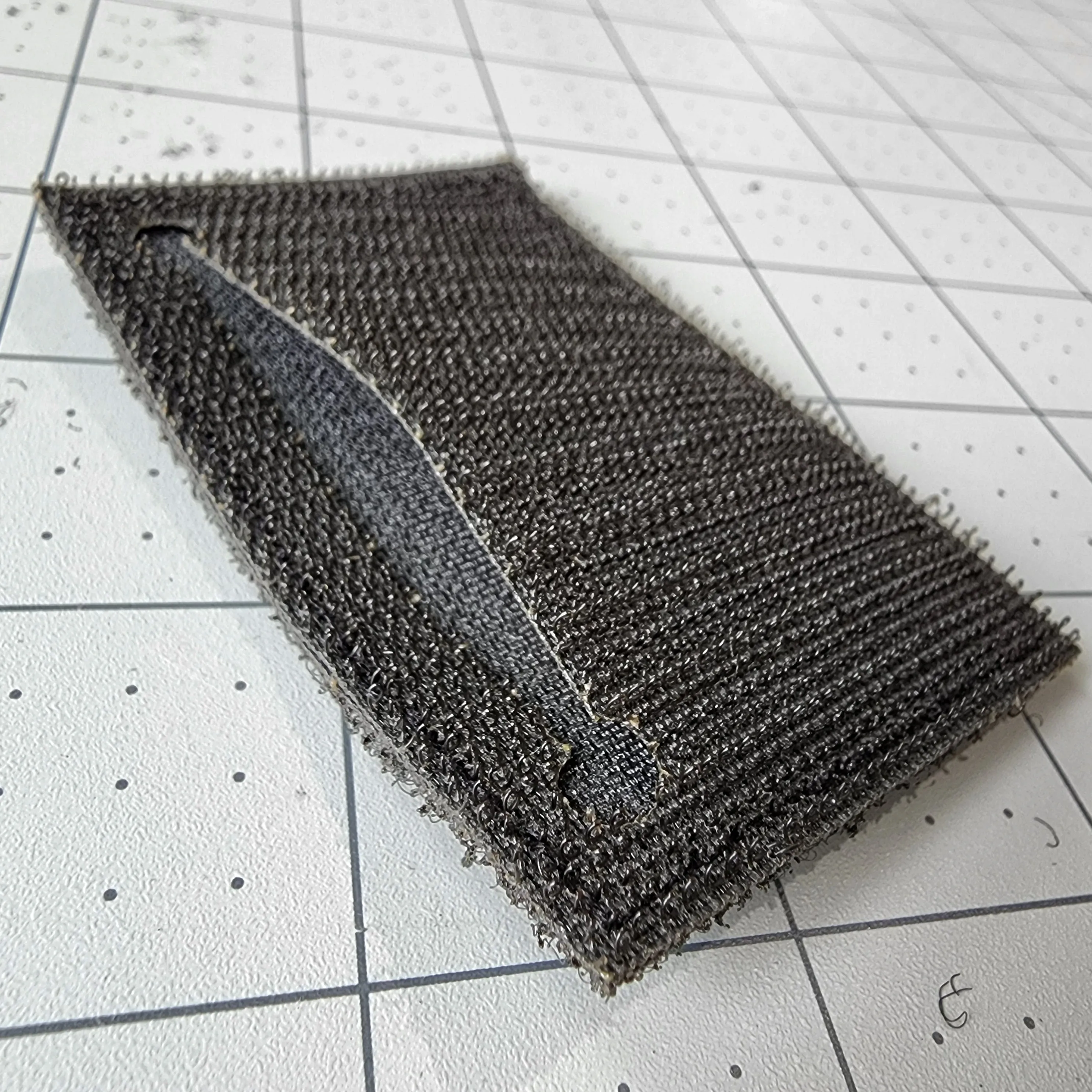 Subdued Storage Pocket Patch: A coverable two layer Velcro patch with hook and loop sides.