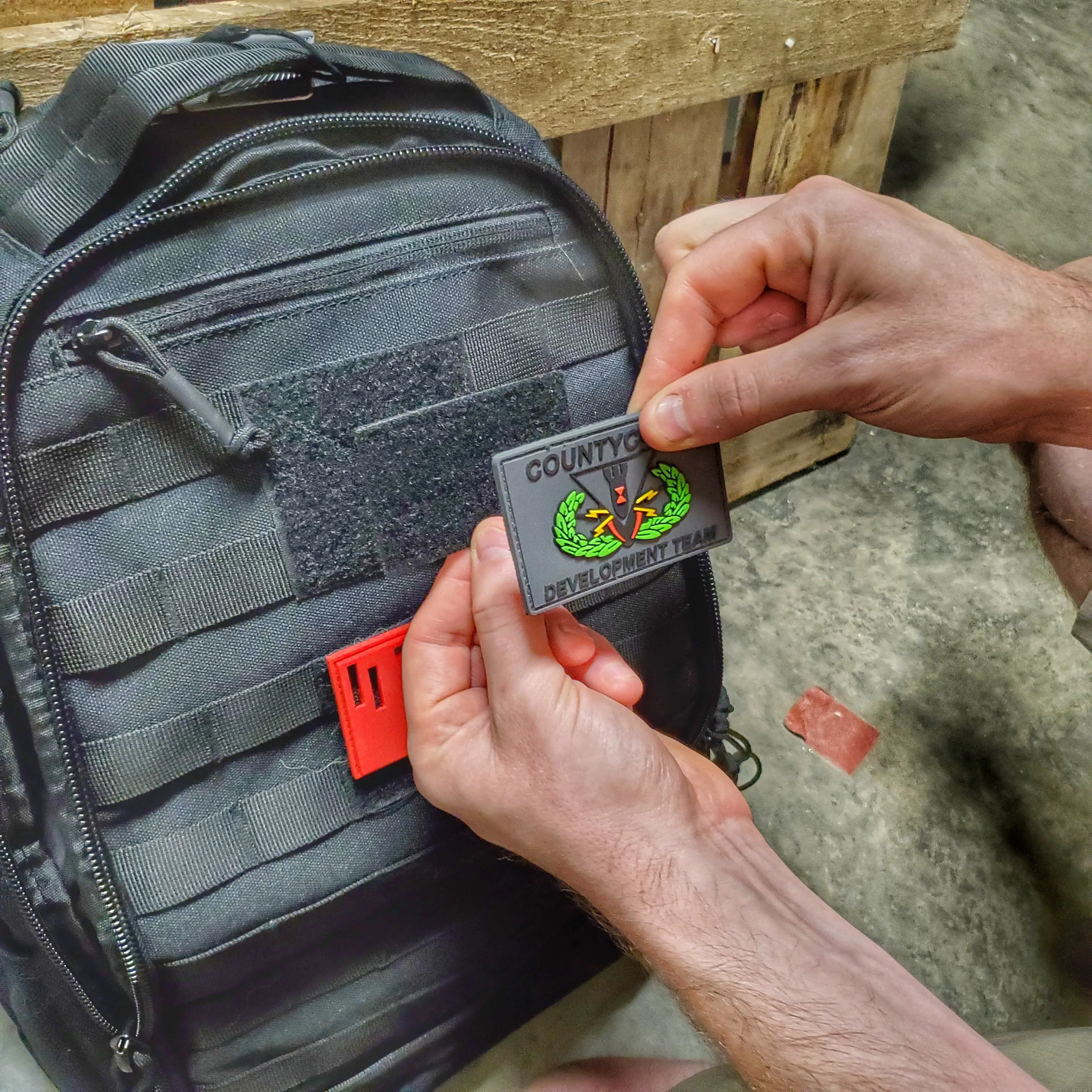 Subdued Storage Pocket Patch: A coverable two layer Velcro patch with hook and loop sides.